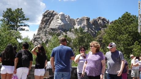 KEYSTONE, SOUTH DAKOTA - JULY 01: Tourists visit Mount Rushmore National Monument on July 01, 2020 in Keystone, South Dakota. President Donald Trump is expected to visit the monument and  make remarks before the start of a fireworks display on July 3. (Photo by Scott Olson/Getty Images)